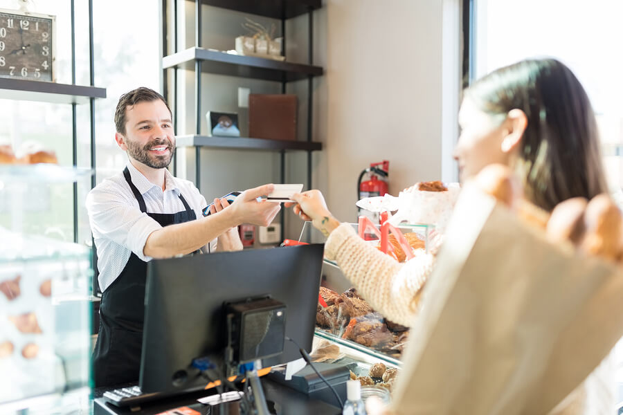 bigstock-Happy-Salesman-Receiving-Credi